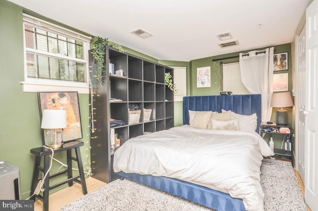 bedroom featuring wood-type flooring