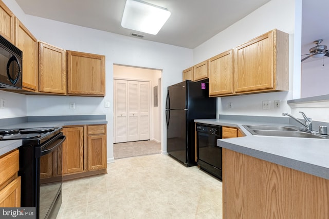 kitchen featuring sink, black appliances, light tile patterned flooring, and ceiling fan