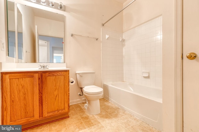 full bathroom featuring tile patterned floors, vanity, tiled shower / bath combo, and toilet