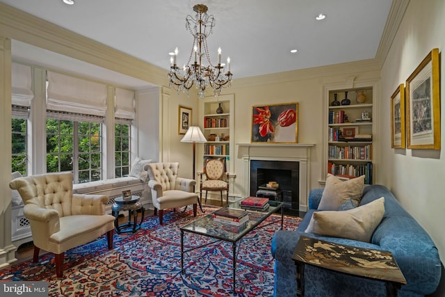 living area with built in features, ornamental molding, wood finished floors, a fireplace, and recessed lighting