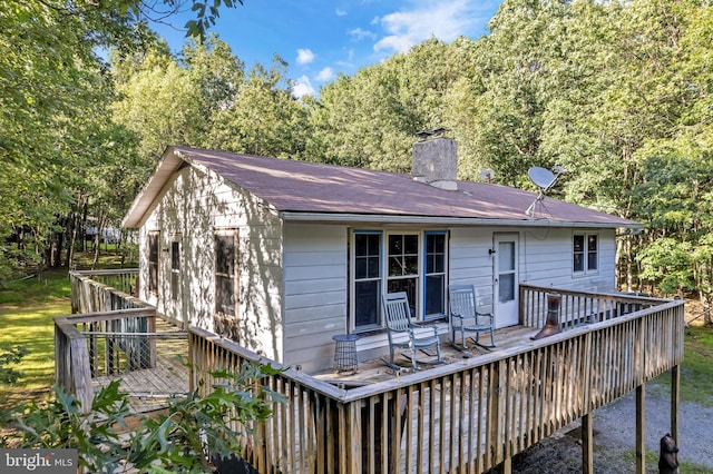 rear view of house with a deck