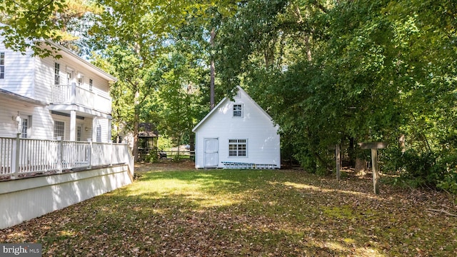 view of yard featuring a wooden deck