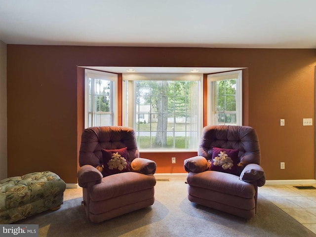 sitting room with light tile patterned flooring