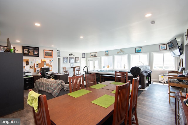 dining room featuring dark hardwood / wood-style flooring