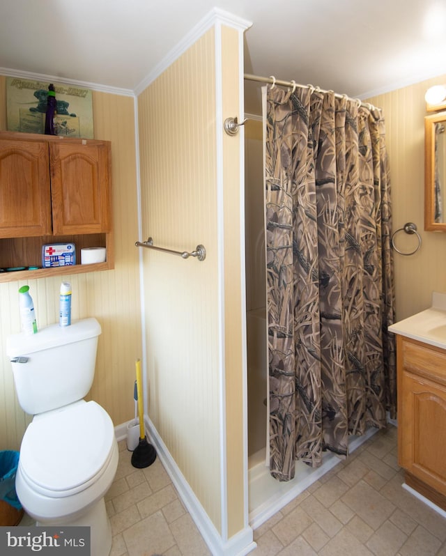 bathroom featuring toilet, tile patterned flooring, ornamental molding, vanity, and a shower with curtain