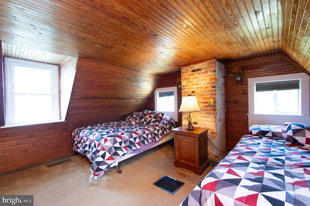 bedroom with wooden walls, wooden ceiling, and vaulted ceiling