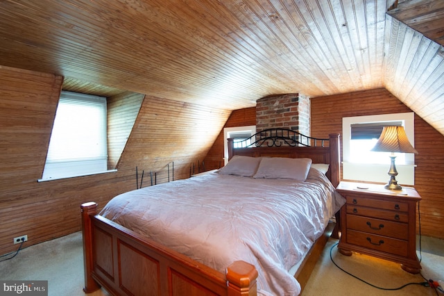 bedroom with wood ceiling, vaulted ceiling, wood walls, and light carpet