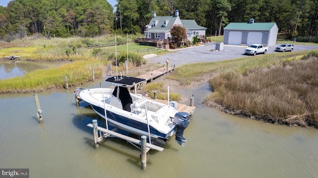 dock area featuring a deck with water view