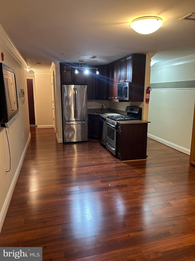 kitchen with crown molding, stainless steel appliances, dark hardwood / wood-style floors, and sink