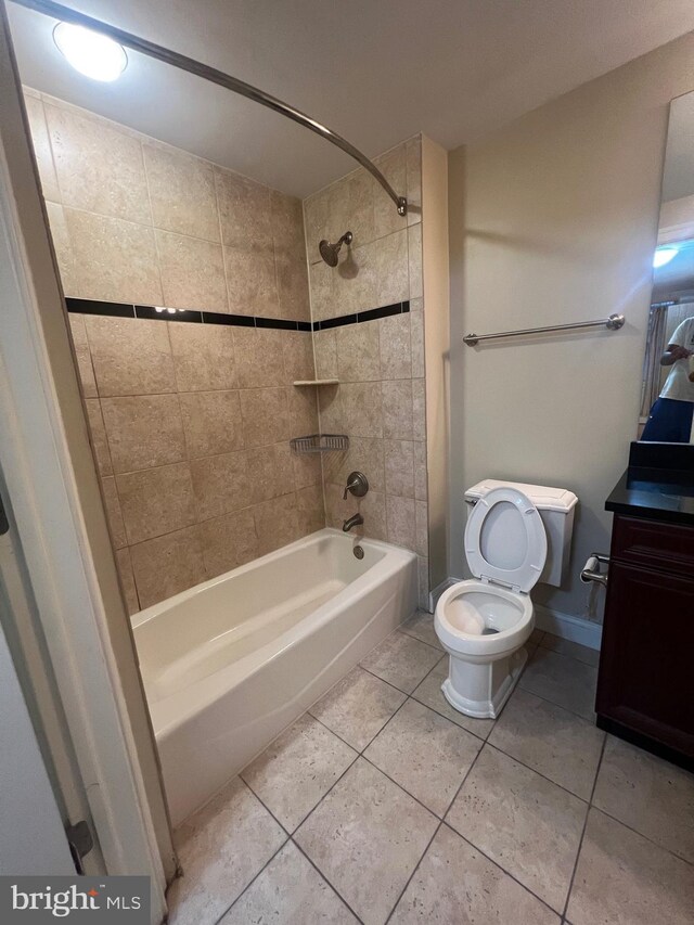 washroom with stacked washer and dryer