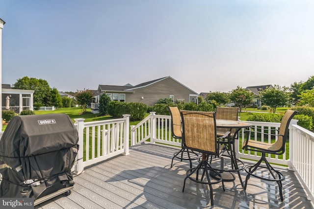 wooden terrace with grilling area