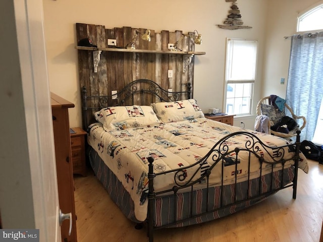 bedroom featuring wood-type flooring