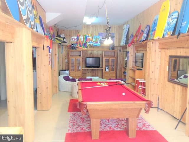 game room with billiards and wooden walls