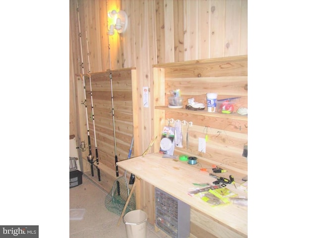 view of sauna / steam room featuring wooden walls