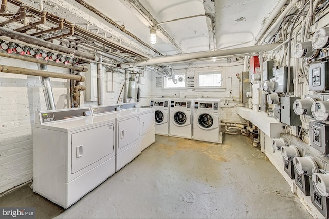 laundry room featuring washing machine and dryer