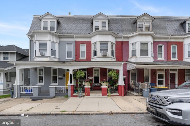 view of property with covered porch