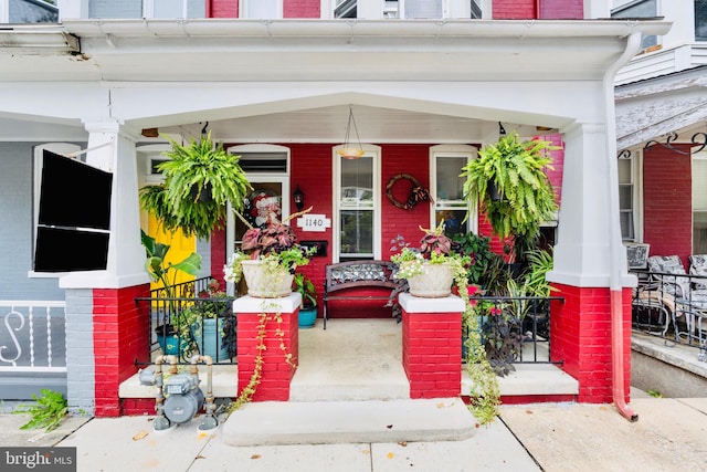 entrance to property with covered porch