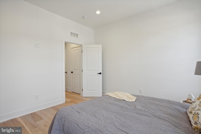 bedroom featuring light wood-type flooring