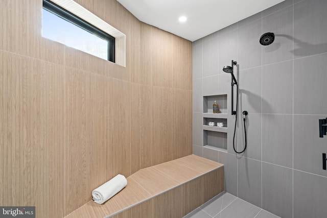 bathroom featuring tiled shower