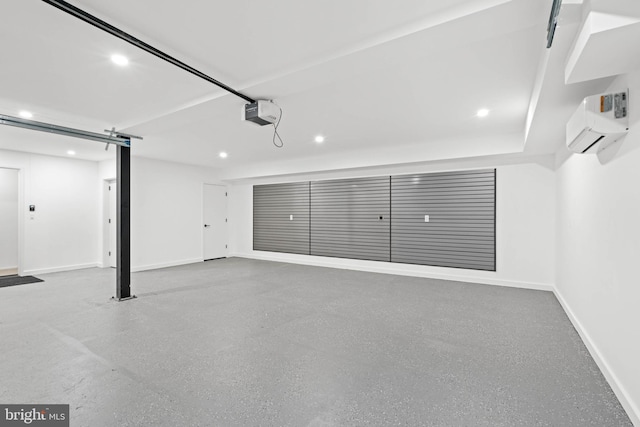 garage featuring a garage door opener and a wall mounted air conditioner