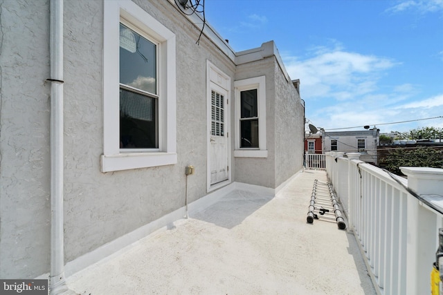 view of home's exterior featuring a balcony