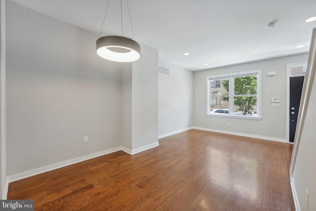 interior space with hardwood / wood-style flooring