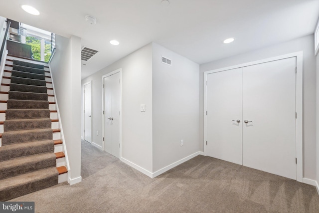 interior space with light colored carpet