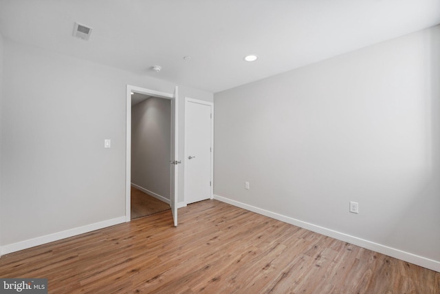 unfurnished bedroom featuring light hardwood / wood-style flooring