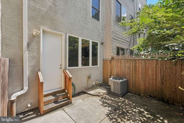 view of patio featuring cooling unit