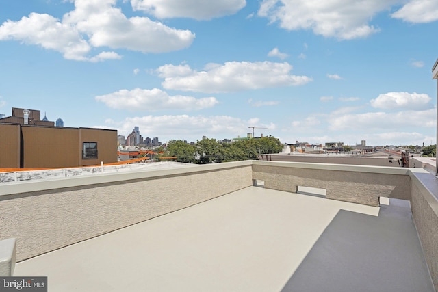 view of patio featuring a balcony