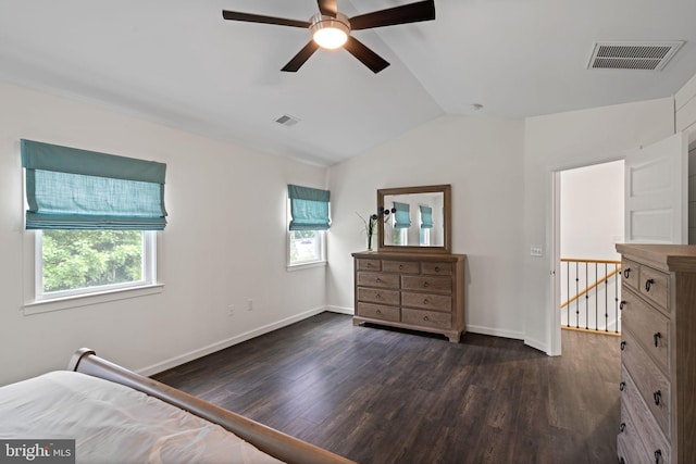 bedroom featuring ceiling fan, vaulted ceiling, and dark hardwood / wood-style floors