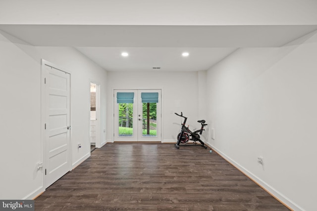 interior space with dark wood-type flooring and french doors