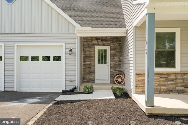 property entrance featuring a garage