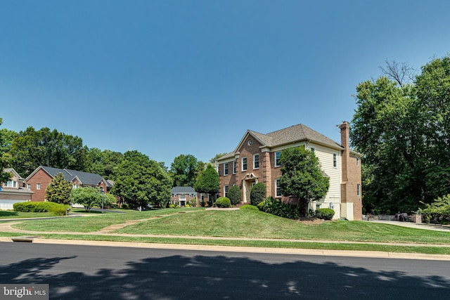 view of front of house with a front lawn