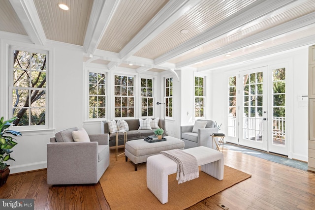 sunroom with beam ceiling