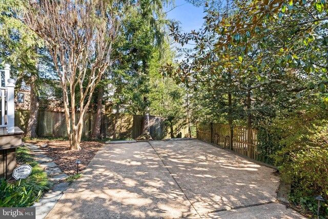 view of gate with fence