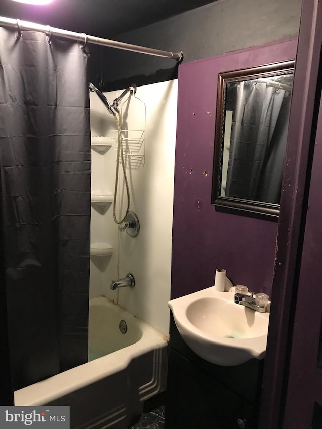 bathroom with shower / bath combination with curtain and vanity