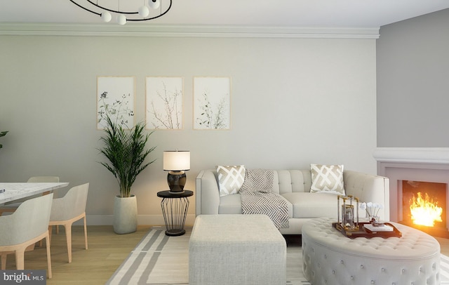 living room featuring ornamental molding and light wood-type flooring