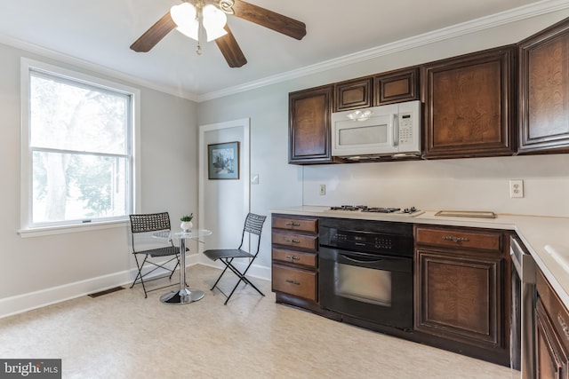 kitchen with dark brown cabinets, white appliances, crown molding, and plenty of natural light