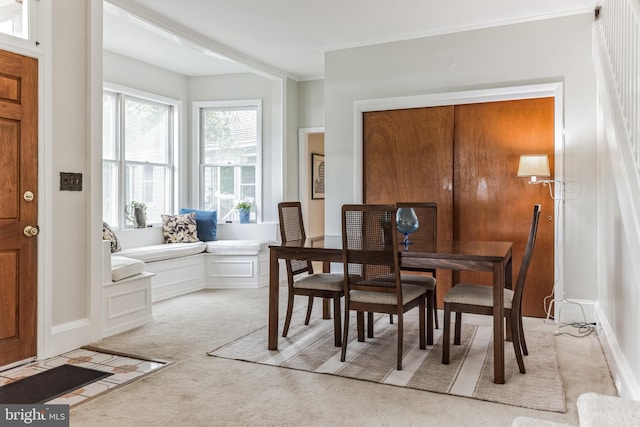 view of carpeted dining space