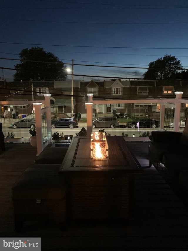 view of front of house with a fire pit