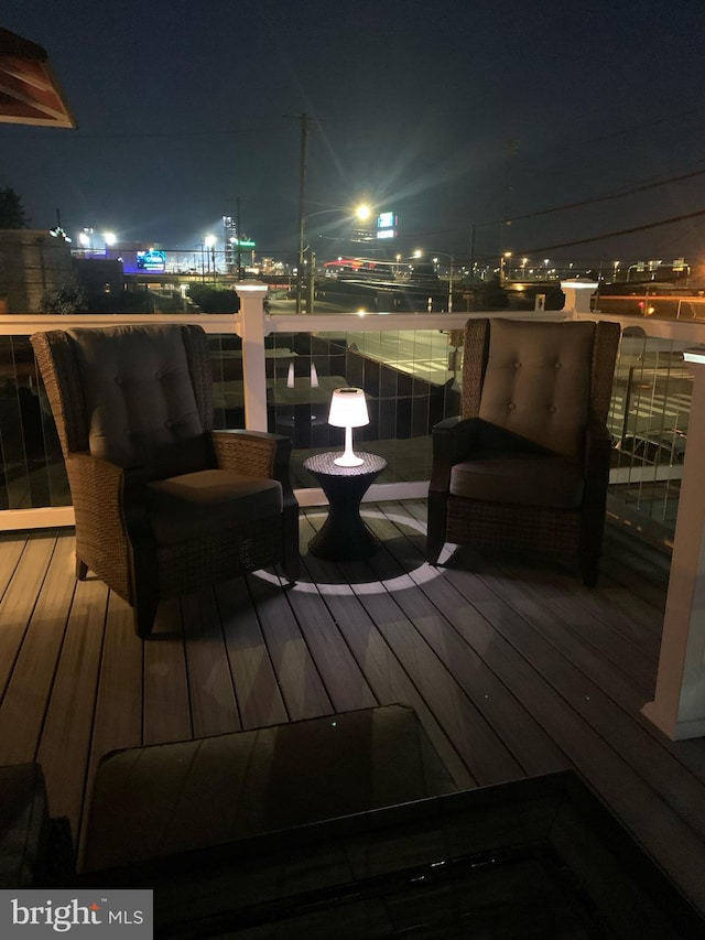 view of deck at twilight