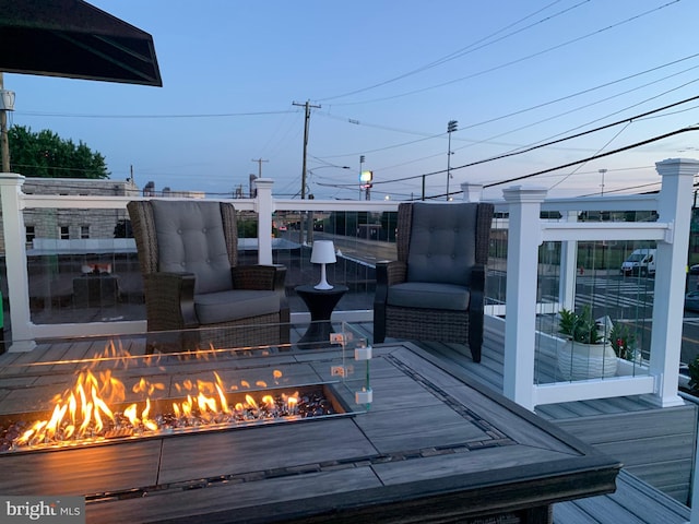 deck with a fire pit