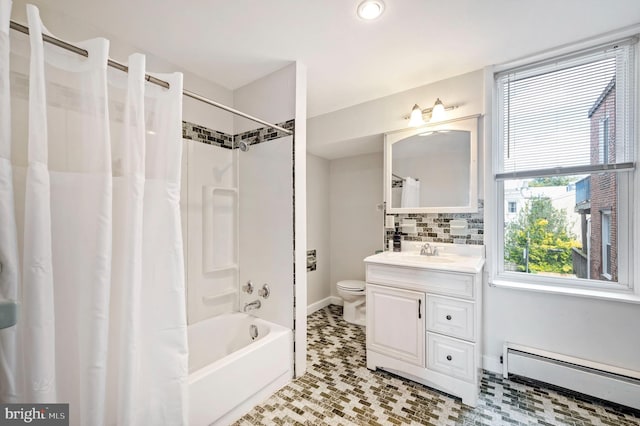 bathroom with baseboards, toilet, a baseboard radiator, shower / bathtub combination with curtain, and vanity