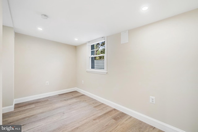 spare room featuring light wood-type flooring