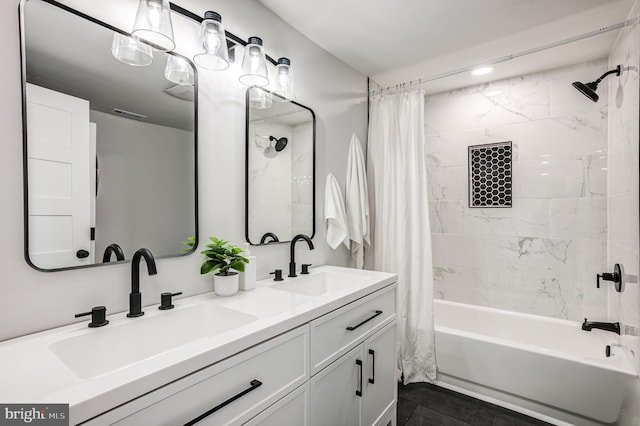 bathroom with vanity, shower / tub combo with curtain, and tile patterned floors