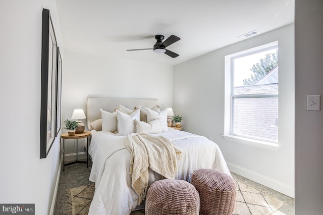 carpeted bedroom featuring ceiling fan