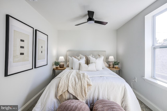 bedroom featuring ceiling fan and carpet floors