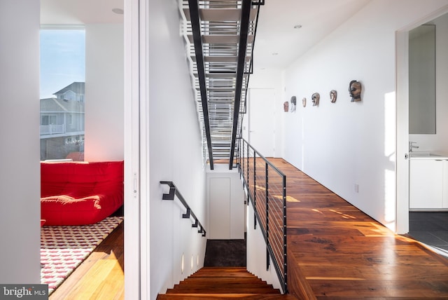 stairs with wood finished floors