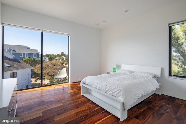 bedroom featuring wood finished floors